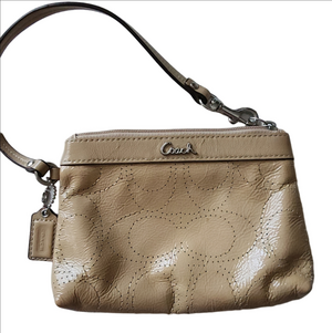 Coach Metallic Perforated Signature C Logo Wristlet. Tan Patent Leather Finish